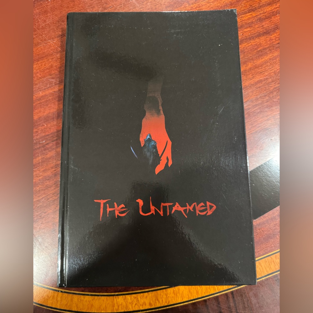 The Untamed Hardcover Book signed by the author